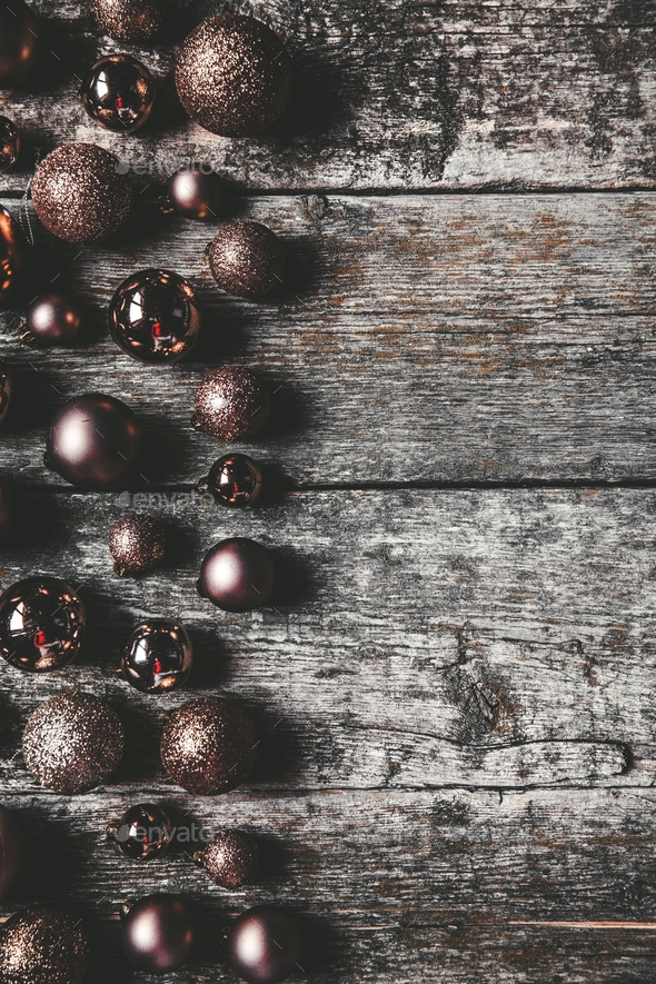 Christmas or New Year background. Vintage Christmas tree toy decoration balls over rustic wooden - Stock Photo - Images