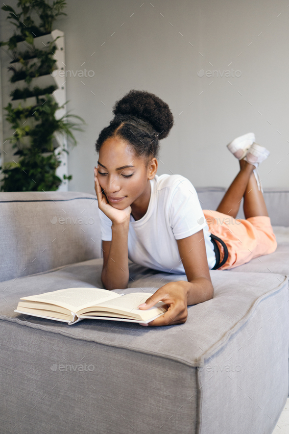 black girl reading a book