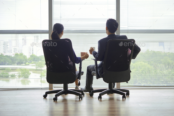 Successful couple having coffee break - Stock Photo - Images