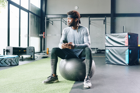 sitting on fitness ball