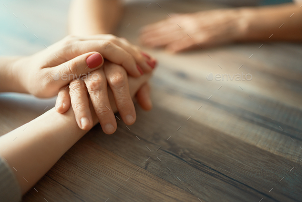 Hands in hands close up - Stock Photo - Images