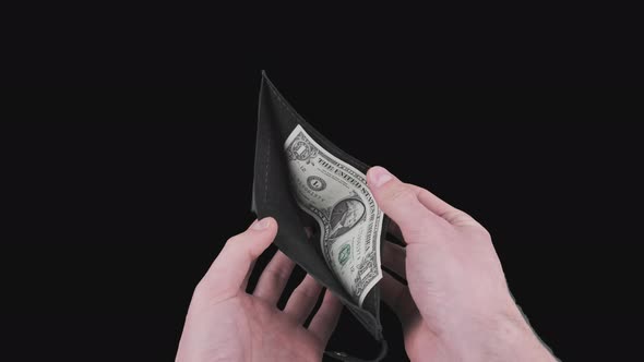 Male Hands Take Out One Dollar From an Empty Black Wallet on Alpha Channel alt