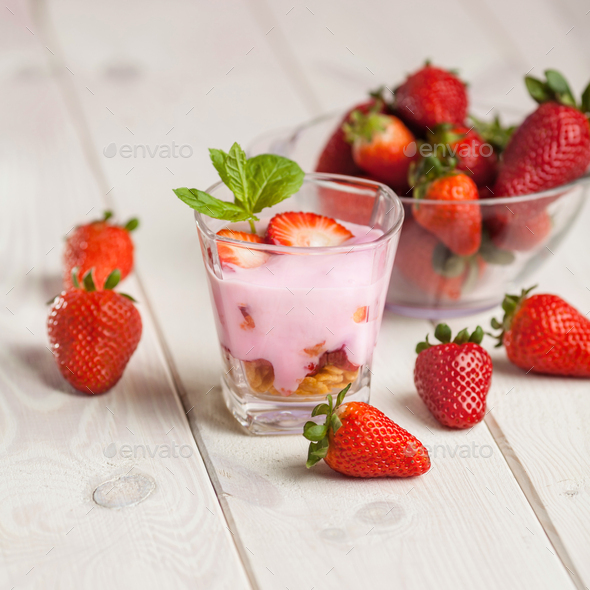 Download Strawberry Yogurt And Granola In Glass Stock Photo By Gpointstudio