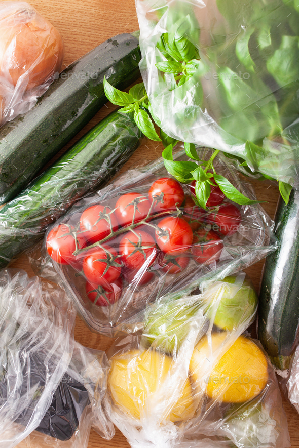 single use plastic packaging issue. fruits and vegetables in pla Stock Photo by duskbabe