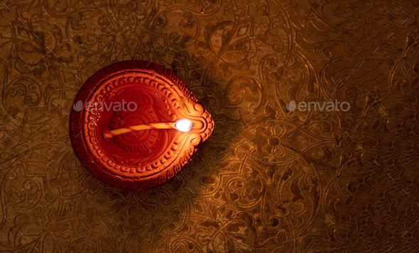 Happy Diwali. Diya oil lamp top view, Stock Photo by rawf8 | PhotoDune