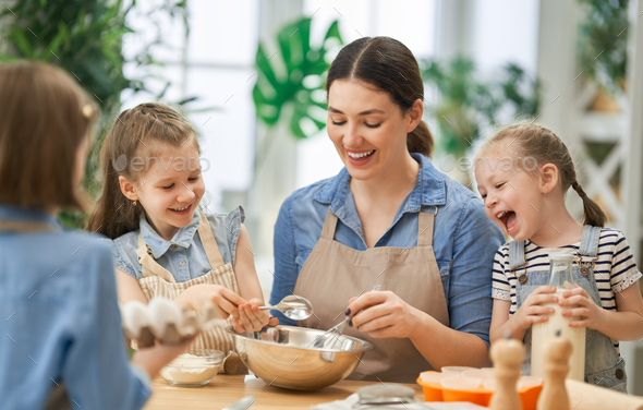 family are preparing bakery together - Stock Photo - Images