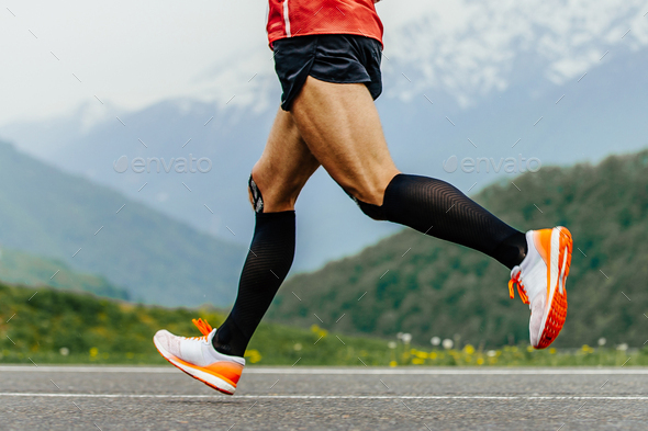 legs men runner in black compression socks