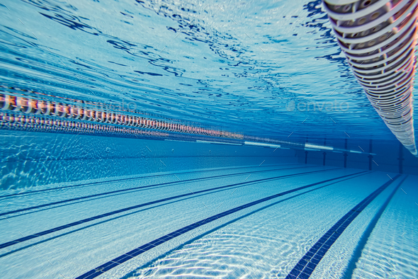 Olympic Swimming pool under water background. Stock Photo by cookelma