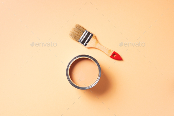 Paint brush and open paint can with on pastel background. Top view, copy space. Appartment - Stock Photo - Images