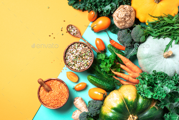 Vegan and vegetarian diet, harvest concept. Autumn vegetables, lentils, beans, raw ingredients for - Stock Photo - Images