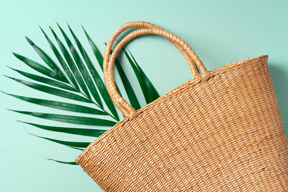 Handmade summer bag on trendy green background. Top view. Fashionable stylish accessory. Natural - Stock Photo - Images