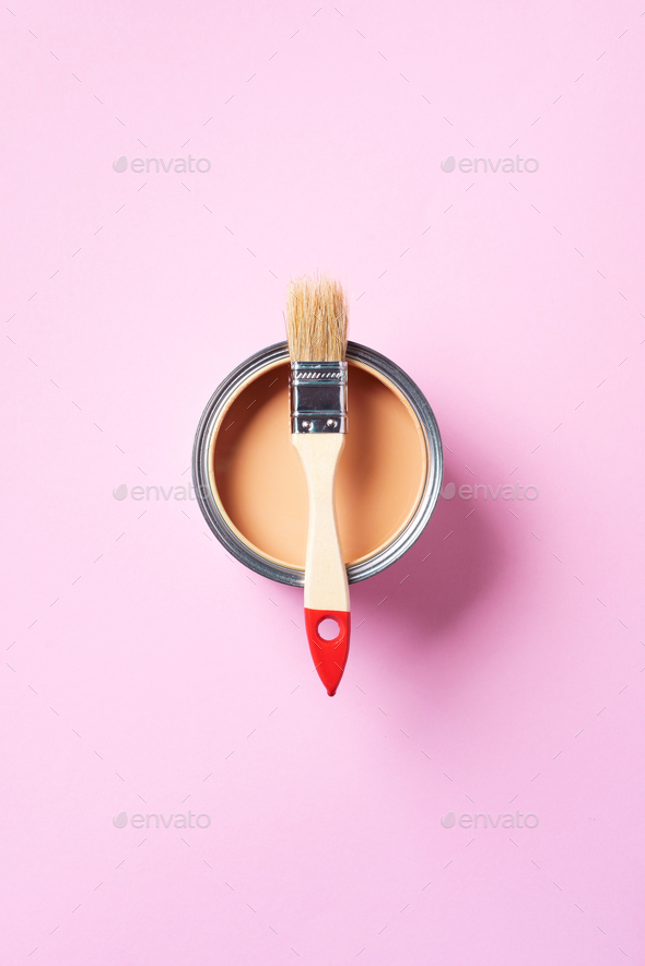 Brush and open paint can with on trendy yellow background. Top view, copy space. Appartment - Stock Photo - Images