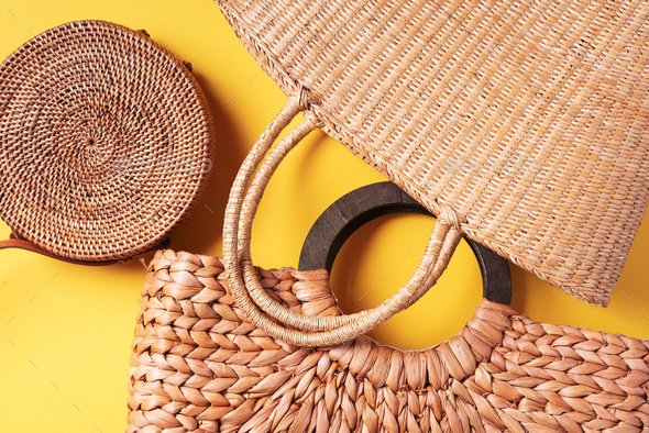 Collection of handmade summer bags on trendy yellow background. Top view. Fashionable stylish - Stock Photo - Images