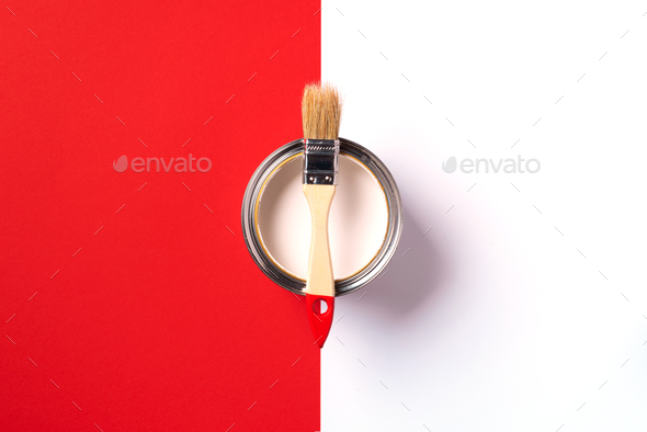 Wooden paint brush, open paint can on trendy red and white background. Top view, copy space - Stock Photo - Images