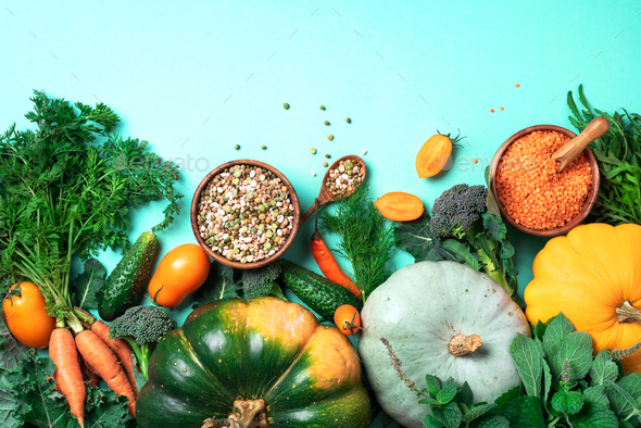 Vegan and vegetarian diet, harvest concept. Autumn vegetables, lentils, beans, raw ingredients for - Stock Photo - Images