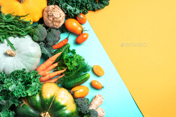 Vegan and vegetarian diet, harvest concept. Autumn vegetables on trendy yellow and green background - Stock Photo - Images