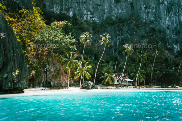 El Nido, Palawan, Philippines. Secluded tropical hut on Pinagbuyutan Island. Amazing white sand - Stock Photo - Images