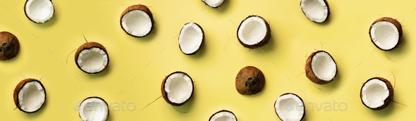 Pattern with ripe coconuts on yellow background. Top View. Copy Space. Pop art design, creative - Stock Photo - Images