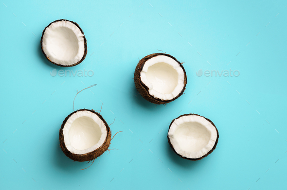 Pattern with ripe coconuts on blue background. Top View. Copy Space. Pop art design, creative summer - Stock Photo - Images