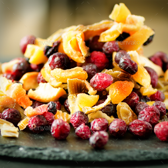 Mix of dried fruits on stone. Cranberry, rhubarb, apple, mango, cherry, peach, apricot. Handmade - Stock Photo - Images