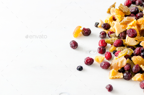 Sweet mix dried fruits on stone. Cranberry, rhubarb, apple, mango, cherry, peach, apricot. High dose - Stock Photo - Images