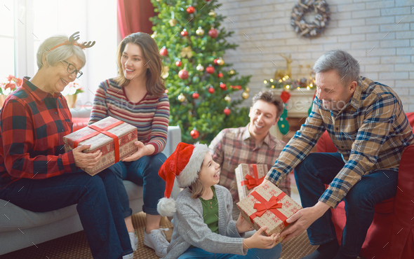 family celebrating Christmas - Stock Photo - Images