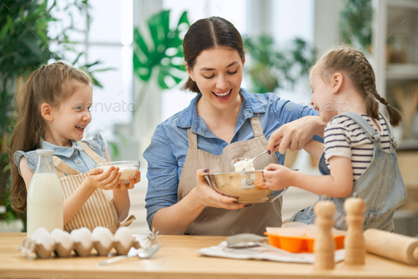 family are preparing bakery together - Stock Photo - Images