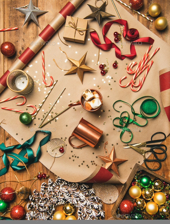 Hot chocolate and Christmas decoration over wooden background, vertical composition - Stock Photo - Images