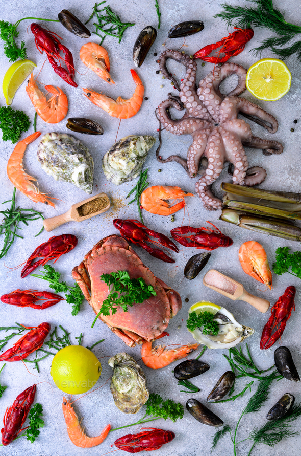 Seafood background - fresh mussels, molluscs, oysters, octopus, razor shells, shrimps, crab - Stock Photo - Images