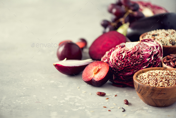 Ingredients for cooking, copy space, top view, flat lay. Purple vegetables, fruits on grey - Stock Photo - Images