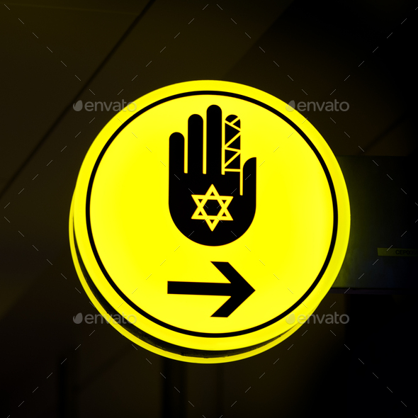 Toilet, wc for hassid (religious Jew) sign. Bright yellow symbol on dark background. Copy space