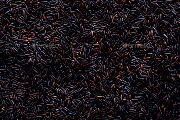 Raw dark red, balck purple rice, texture. Riceberry pattern background. Food ingredient background - Stock Photo - Images