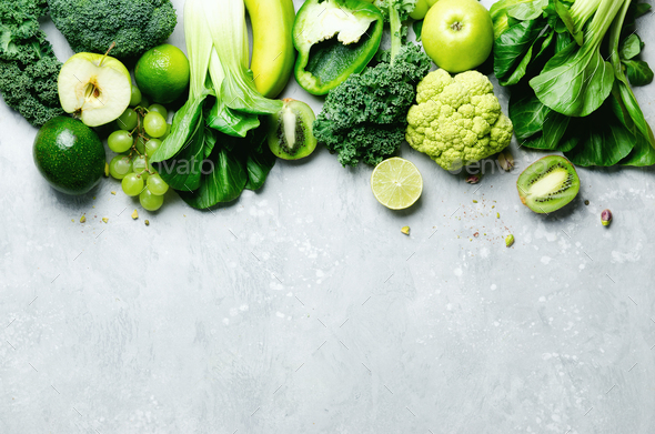 Organic green vegetables and fruits on grey background. Copy space, flat lay, top view. Green apple - Stock Photo - Images