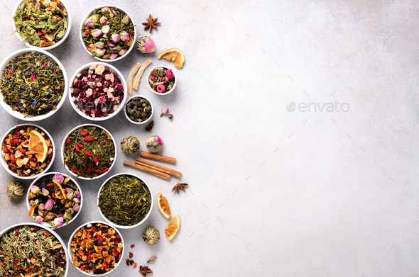 Assortment of dry tea in white bowls. Tea types backgound: green, black, floral, herbal, mint - Stock Photo - Images