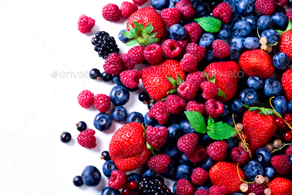 Assortment of strawberry, blueberry, currant, mint leaves. Food frame, border design. Vegan and - Stock Photo - Images