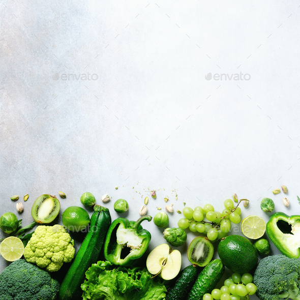 Organic green vegetables and fruits on grey background. Copy space, flat lay, top view. Green apple - Stock Photo - Images