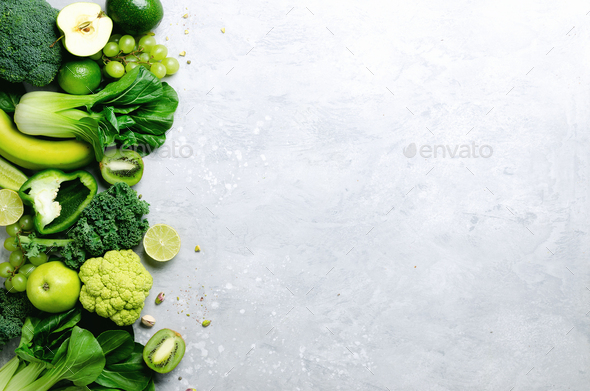 Organic green vegetables and fruits on grey background. Copy space, flat lay, top view. Green apple - Stock Photo - Images