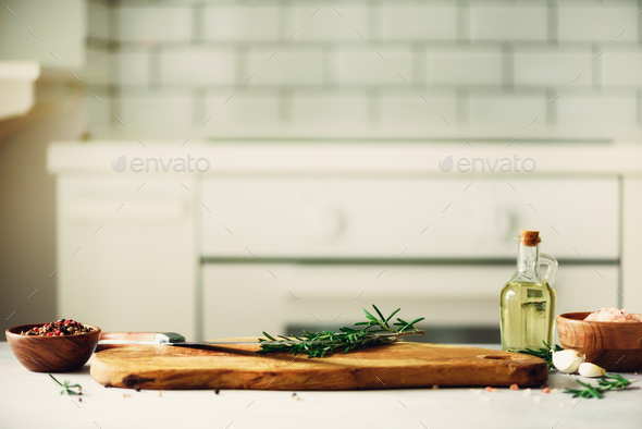 Food cooking ingredients on white kitchen design interior background with rustic wooden chopping - Stock Photo - Images