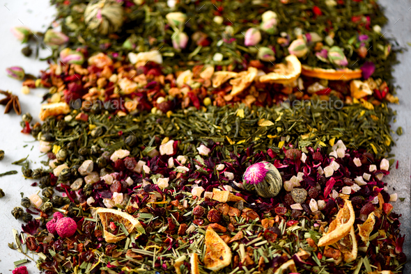 Tea background: green, black, floral, herbal, mint, melissa, ginger, apple, rose, lime tree, fruits - Stock Photo - Images