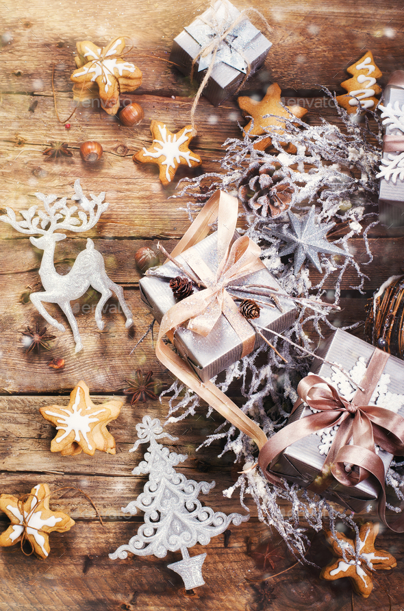 Christmas wreath with ginger cookies, silver stars, cones, hazelnut, anise, tape, ribbon, snowflakes - Stock Photo - Images