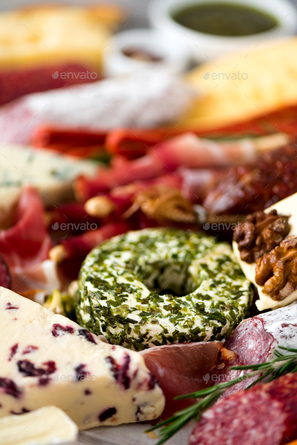 Cold smoked meat plate. Traditional italian antipasto, cutting board with salami, prosciutto, ham - Stock Photo - Images