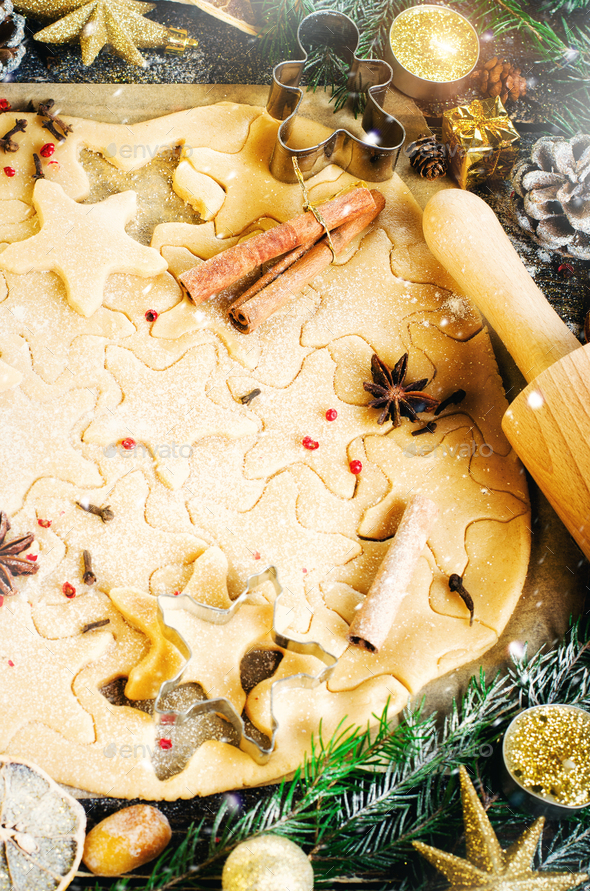 Ginger Bread Cookies. Christmas background with gifts, candle, cones, cinnamon sticks, dry orange - Stock Photo - Images