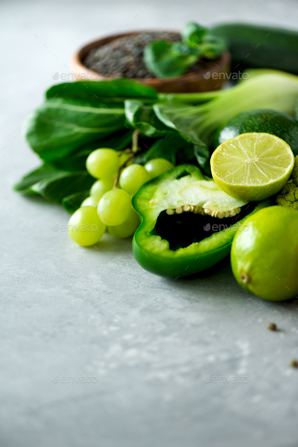 Organic green vegetables and fruits on grey background. Copy space, flat lay, top view. Green apple - Stock Photo - Images