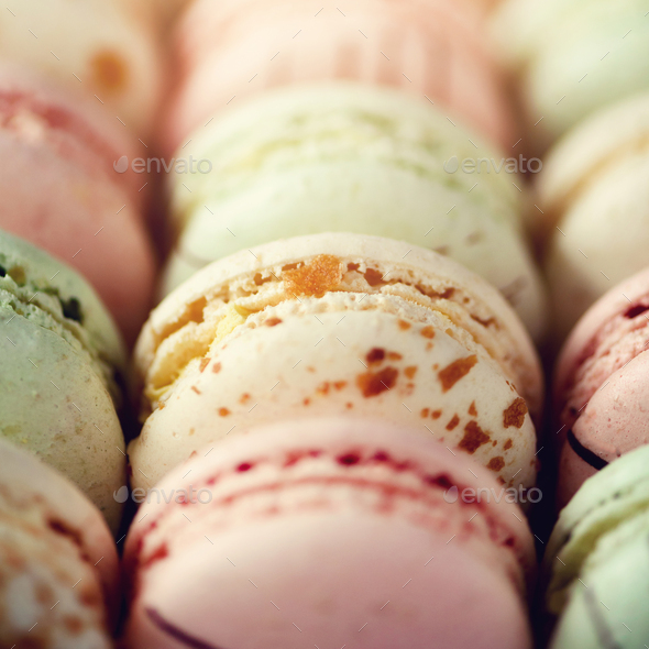 Colorful french macaroons flat lay. Pastel colors pink, green, yellow macarons with copy space, top - Stock Photo - Images