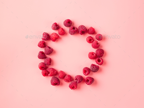 Raspberry in round shape on pink, copy space - Stock Photo - Images