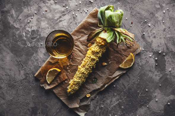Grilled corn cobs with sauce, coriande. Mexican food. Top view. Copy space, healthy food, vegetables - Stock Photo - Images