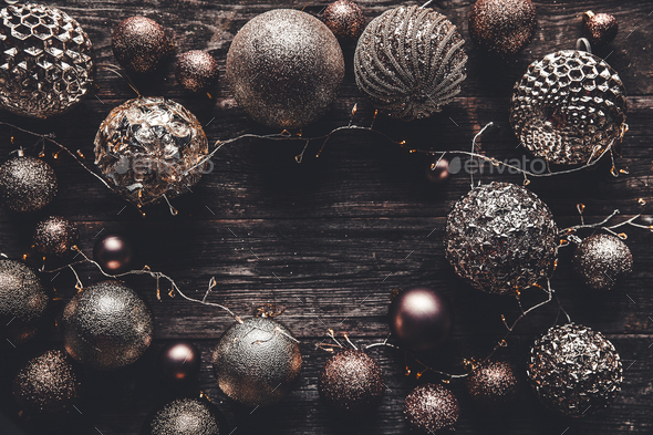Christmas or New Year background. Vintage Christmas tree toy decoration balls and light garland - Stock Photo - Images