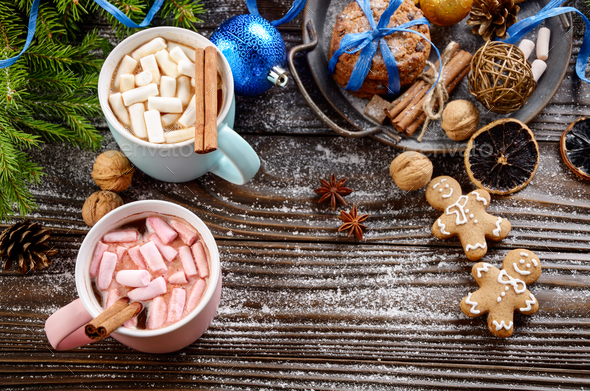 Flat lay Christmas background of two mugs of hot chocolate with - Stock Photo - Images