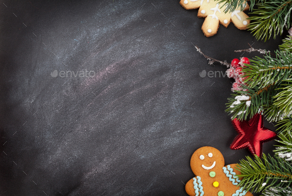 Christmas cookies and fir tree branch - Stock Photo - Images