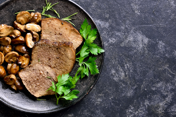 Slow cooked beef with mushrooms - Stock Photo - Images